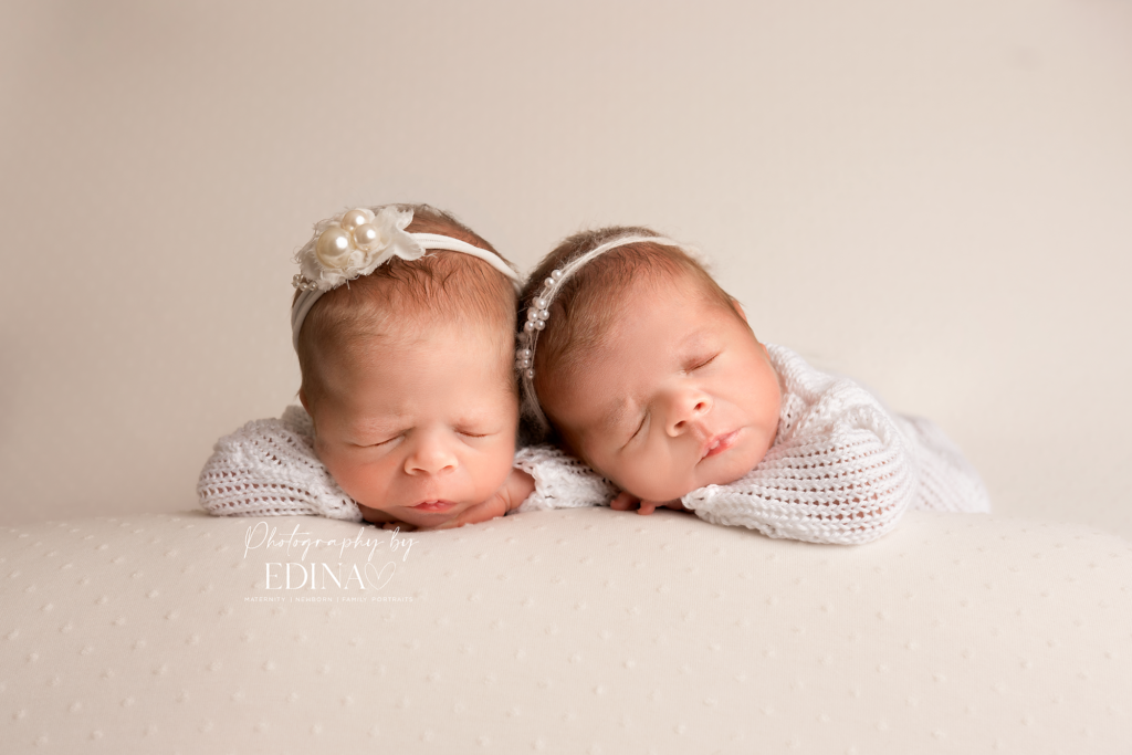 newborn twin girls posed on a beanbag on a photoshoot in York