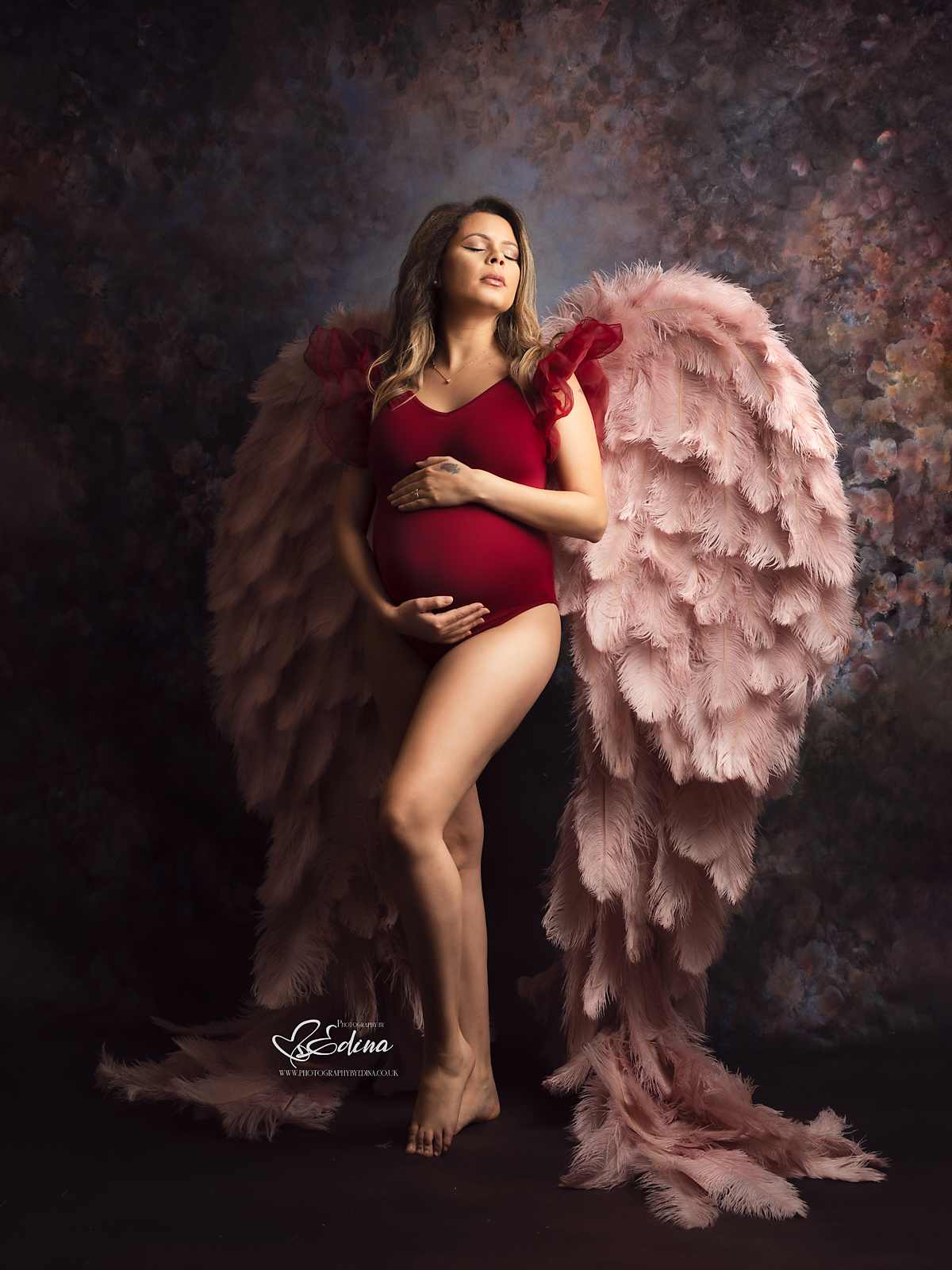 woman wearing wings on her maternity session in York 