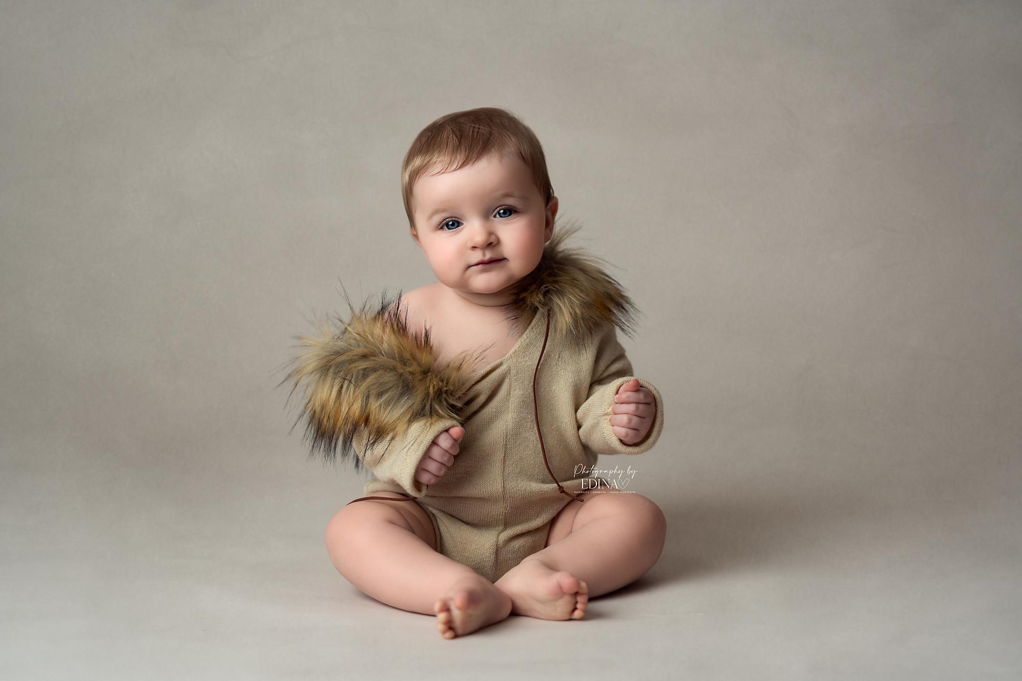 older baby wearing furry outfit on a photo shoot in York