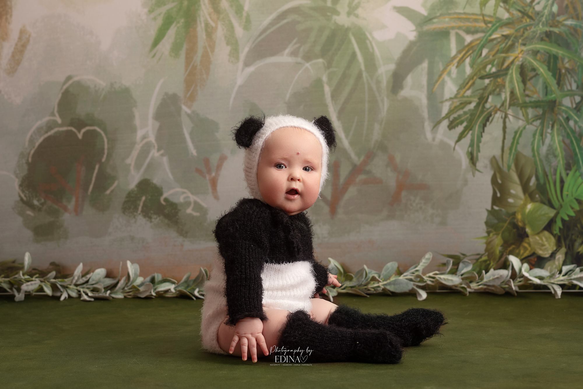 baby wearing panda outfit on a photo shoot in York