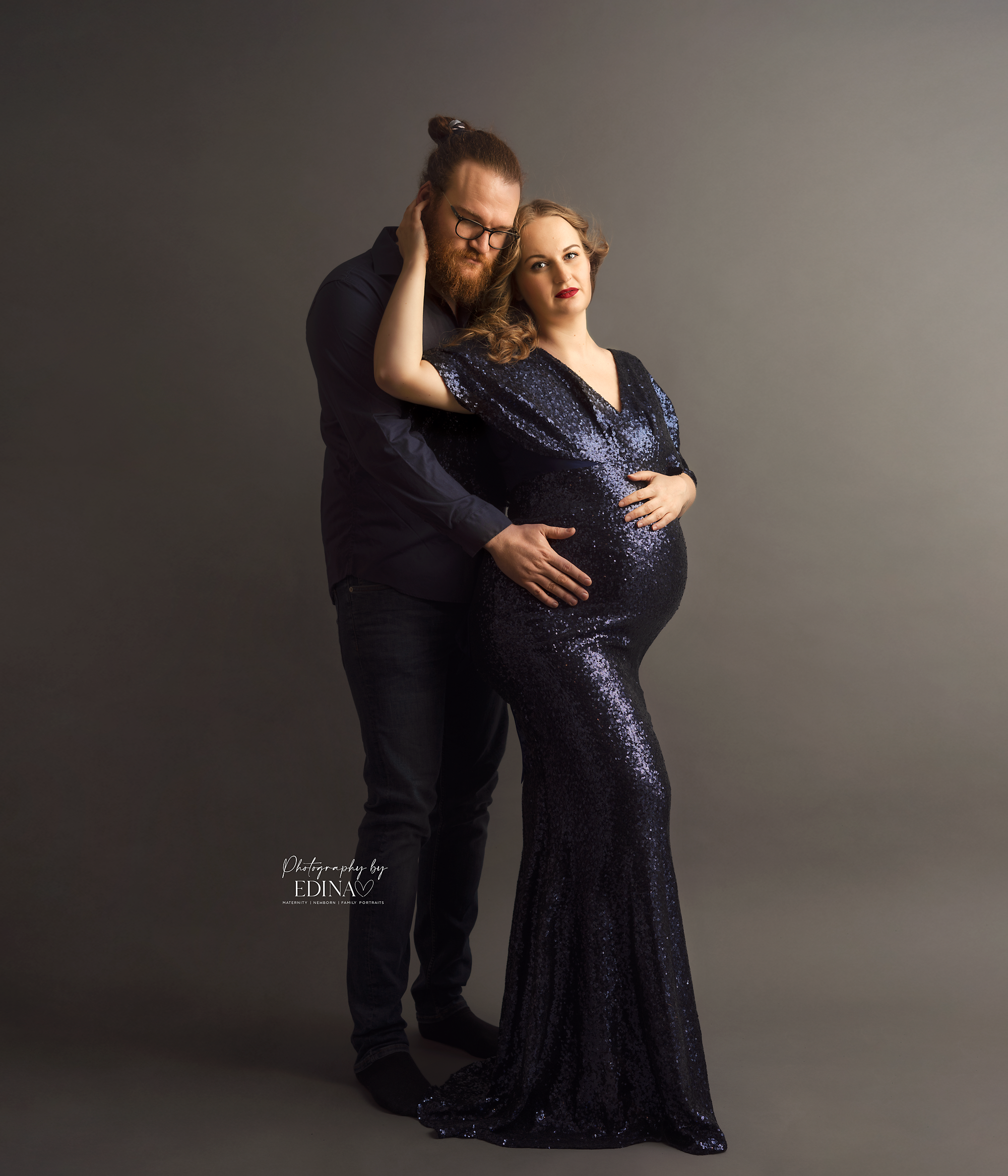 pregnant couple posing in York maternity session